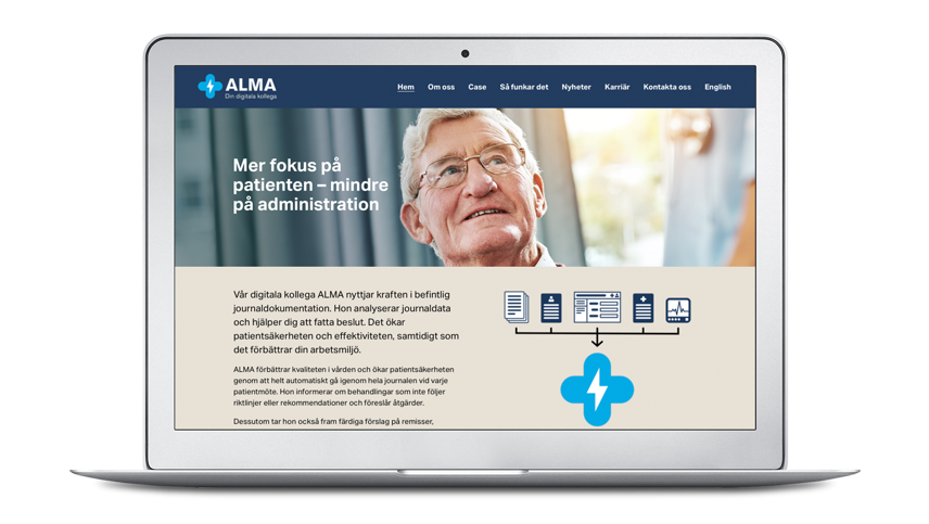 Bild på laptop med en vy från Almas webbplats.